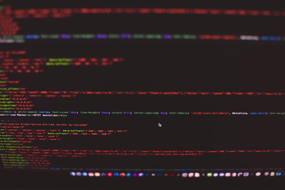 A close-up image of a computer screen displaying colorful lines of programming code, including syntax elements such as variables, functions, and conditional statements, with some lines highlighted in 